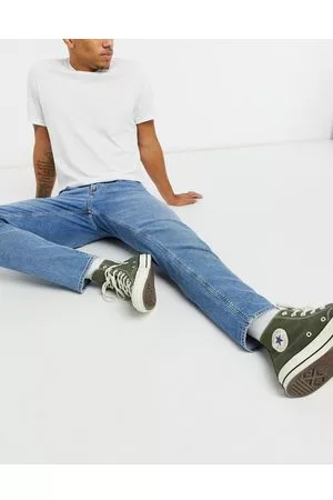 ASOS Stretch tapered jeans in vintage light wash