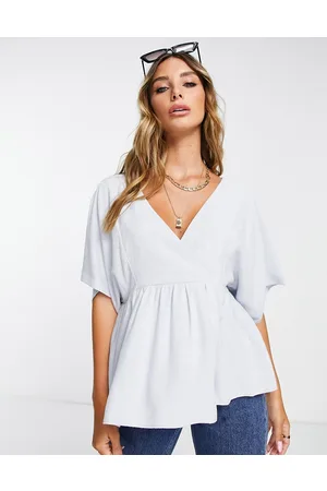 ASOS Wrap top with angel sleeve & peplum hem in icy