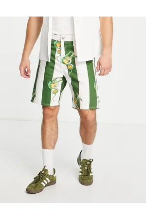 JACK & JONES Premium denim shorts in green stripe with snake print