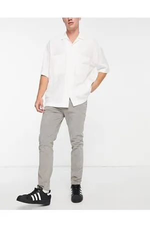ASOS Skinny cord trousers in charcoal with snow wash