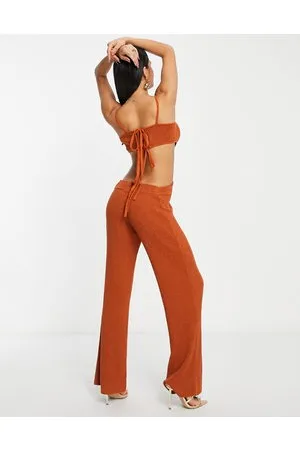 ASOS Knitted festival jumpsuit with cut out details in