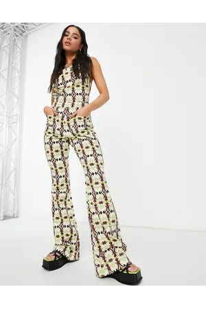 ASOS Halter neck jumpsuit with flare leg in geo print