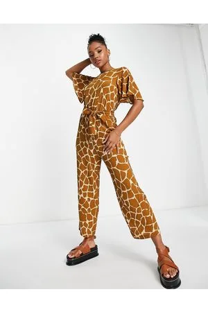 Monki Relaxed jumpsuit with tie waist in giraffe print