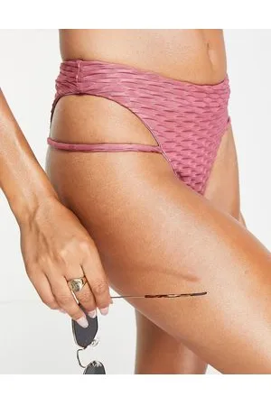 The Couture Club Textured bikini bottoms with strap detail in rose