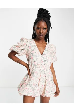 In The Style X Lorna Luxe puff sleeve flippy playsuit in floral print