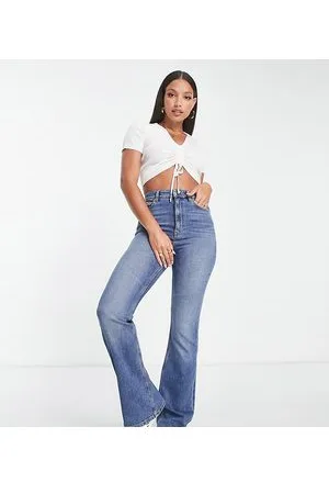 ASOS Tall flared jeans in mid