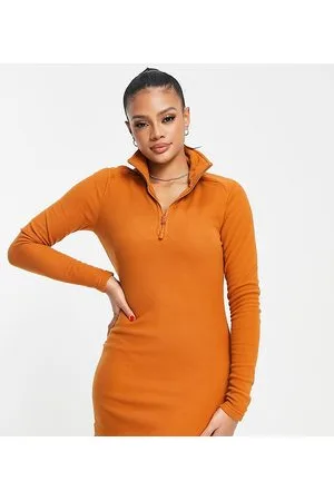 The North Face Glacier 1/4 zip fleece dress with neck logo in Exclusive at ASOS