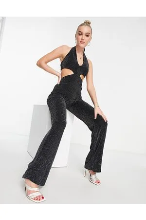 Monki Cut out glitter halter neck jumpsuit in black and
