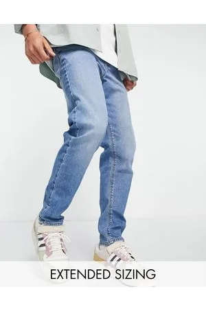 ASOS Stretch tapered jeans in 90s mid wash