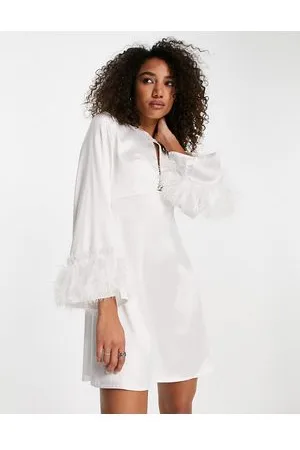 Twisted Wunder Cut out mini dress with faux feather cuffs