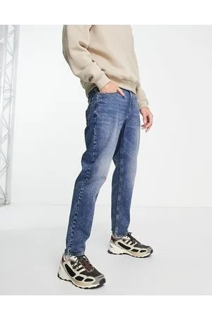 ASOS Tapered jeans in tinted mid wash