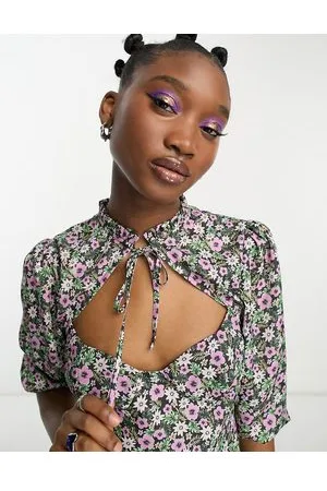 The Frolic Frill neck cut-out detail blouse in floral