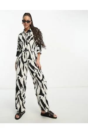 Monki Tie waist jumpsuit in lack and beige print