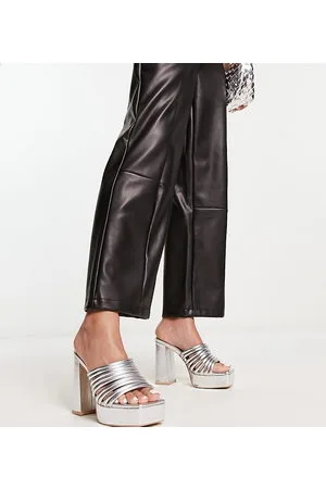 Raid Stella platform mules in metallic
