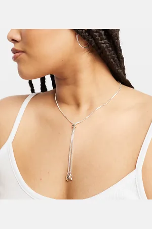 ASOS ASOS DESIGN Curve lariat necklace with star pendant in tone
