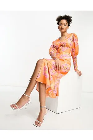 In The Style Button through shirred cuff detail midi tea dress in orange floral print