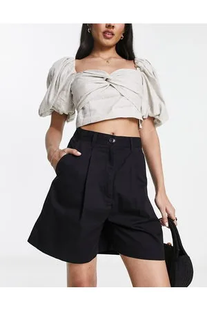 Monki Tailored turn-up shorts in