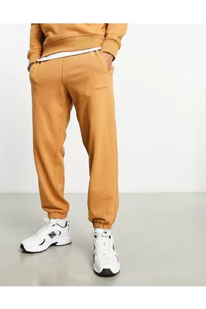New Balance Athletics State Sweatpant in tan
