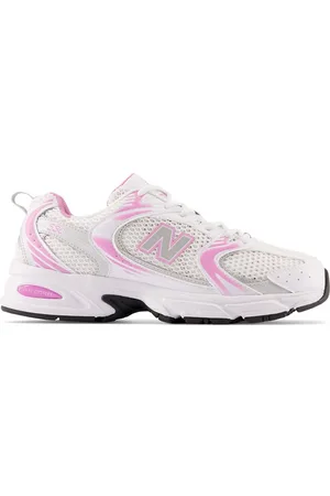 New Balance 530 trainers in and pink