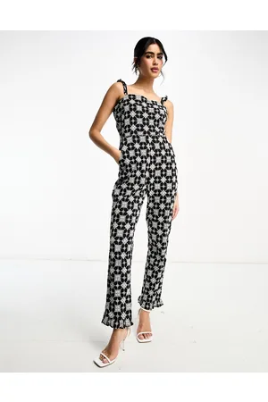 Never Fully Dressed Broderie jumpsuit in monochrome print