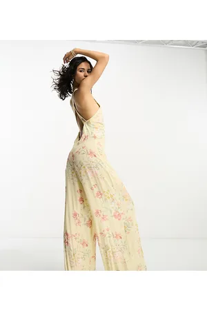 Reclaimed Sleeveless jumpsuit in creamy floral