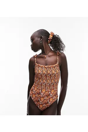 Topshop Tie-shoulder shirred swimsuit in brown ditsy floral with matching srunchie