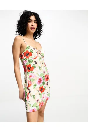 NA-KD X Jasmin Azizam spaghetti strap mini dress in floral print