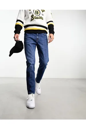 Lee Austin tapered fit jeans in mid vintage wash