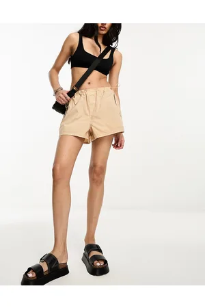 River Island Low rise parachute shorts in beige