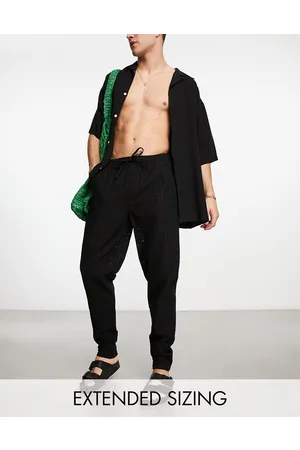 ASOS Relaxed trousers in broderie texture in