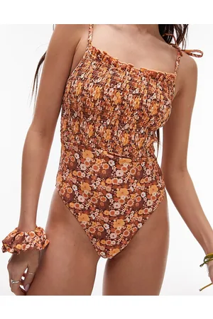 Topshop Tie-shoulder shirred swimsuit in brown ditsy floral with matching scrunchie