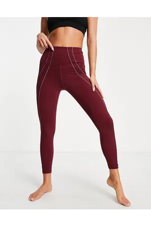 Nike Nike Yoga Dri-FIT lurex tape 7/8 high-waisted leggings in burgundy