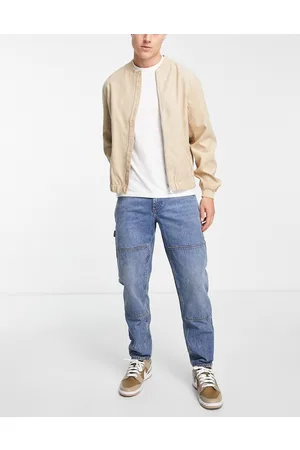 ASOS Tapered leg carpenter jeans in light wash