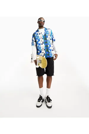 ASOS Oversized revere longline bowling shirt in floral photographic patchwork print