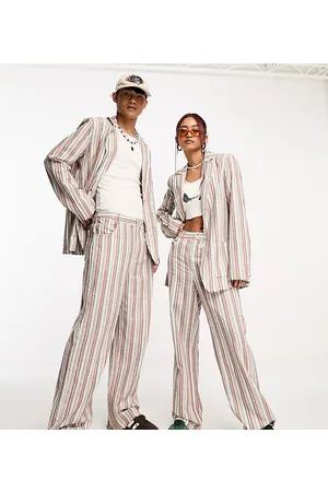 Reclaimed Unisex limited edition suit trousers in summer stripe with fraying