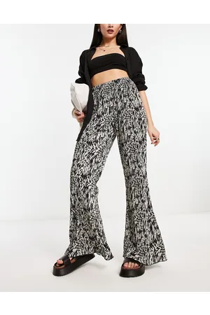 Urban Threads Plisse trousers in abstract animal print