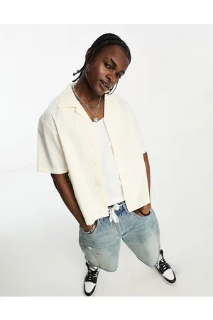 Jordan Statement shirt in ivory with all over logo