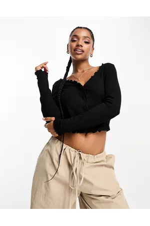 Monki Ribbed button front long sleeve top with lettuce edge in