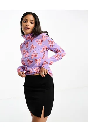 Monki Long sleeve high neck top in bow print