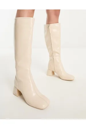 Circus NY Knee boots in vanilla bean crinkle patent