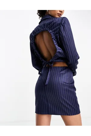 KYÒ The Brand low rise mini skirt with asymmetric hem co-ord in pinstripe