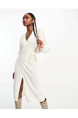 In The Style Exclusive knitted wrap midi jumper dress in cream