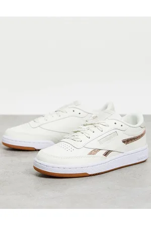 Reebok Club C 85 trainers in chalk with bronze details