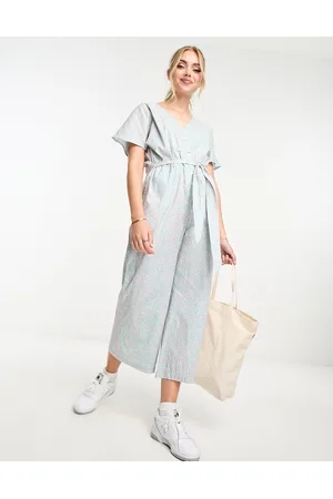 Monki V neck tie waist short sleeve jumpsuit in polka dot print