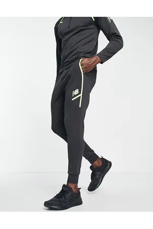 New Balance Tenacity Grit football sweatpants in