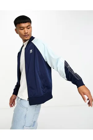 adidas SPRT tricot track top in and light blue