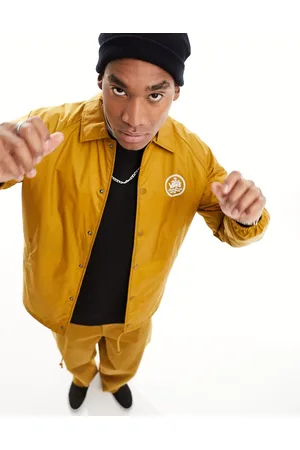 Vans Torrey coach jacket in golden