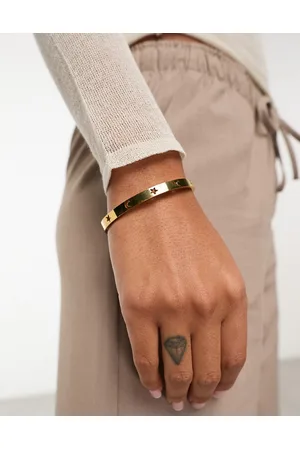 ASOS Waterproof stainless steel bangle with celestial design