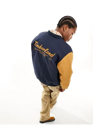 Timberland Utility varsity bomber jacket with back print in with contrast sleeves