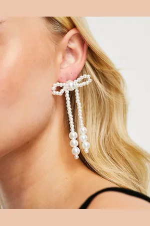 True Decadence Faux pearl statement bow earrings in